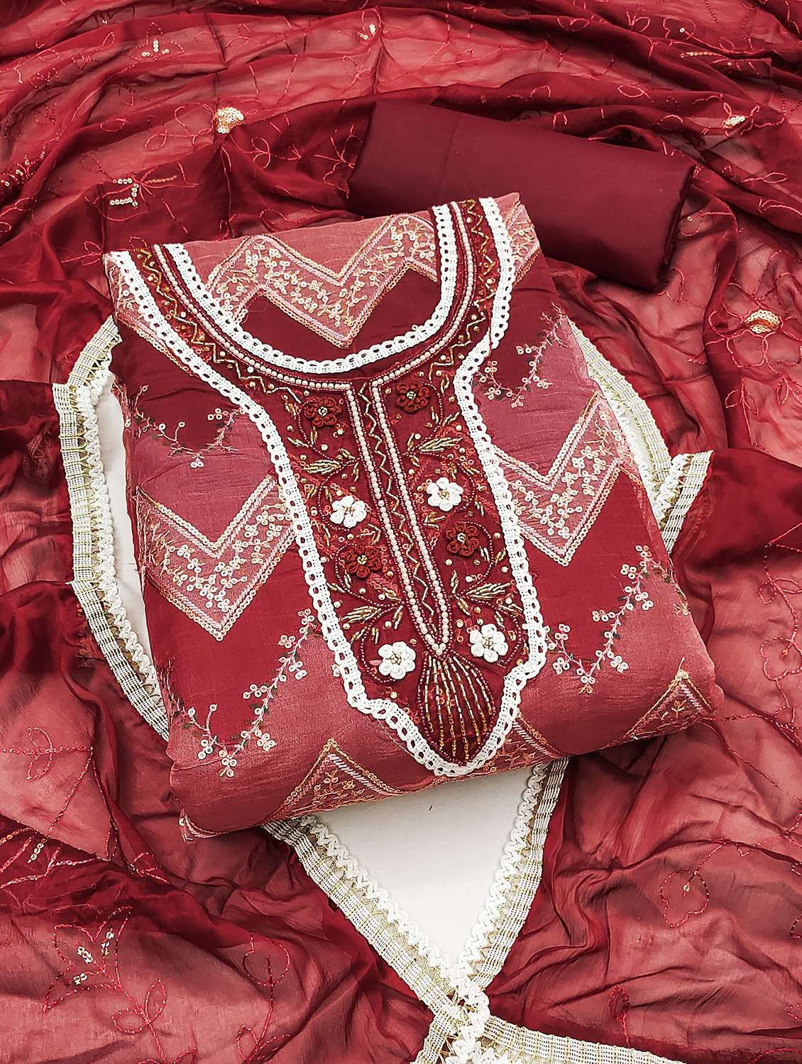 women printed unstitched suit set