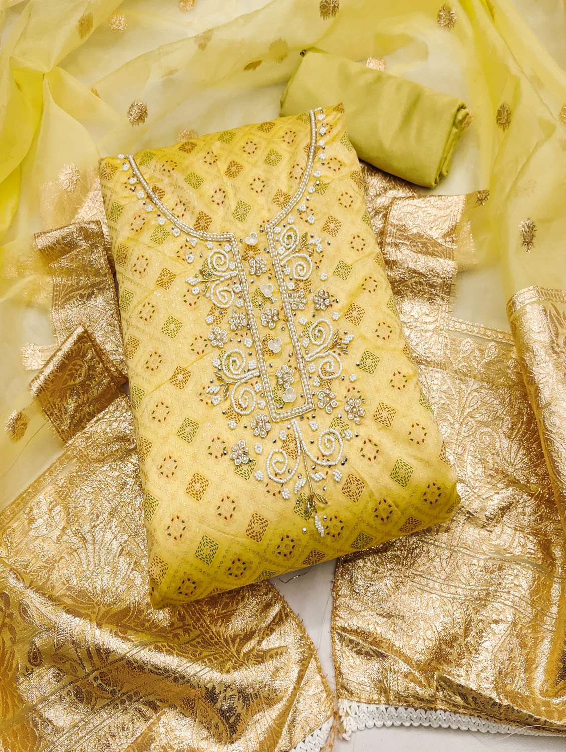 women printed unstitched suit set