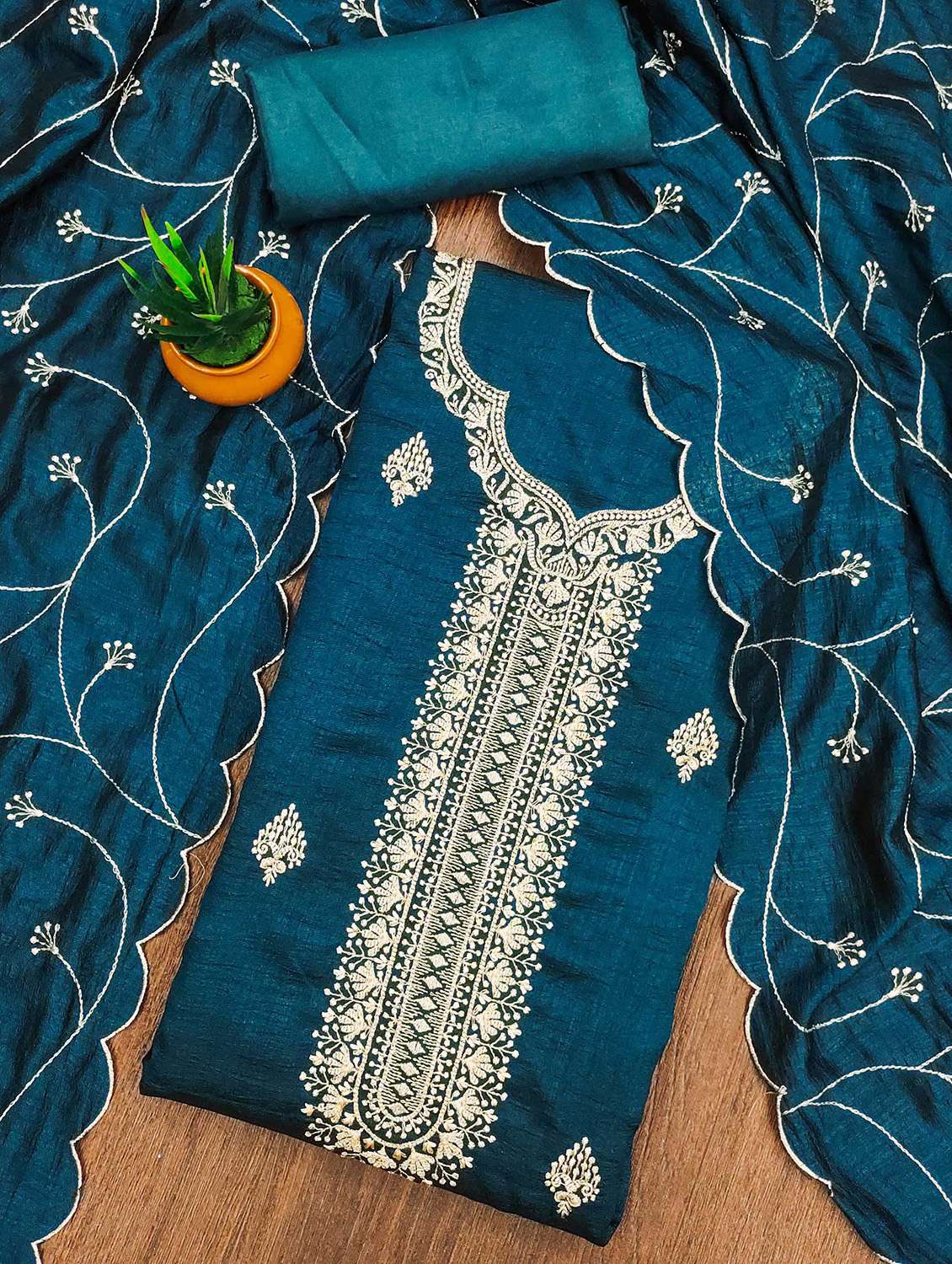 women solid with work unstitched suit set