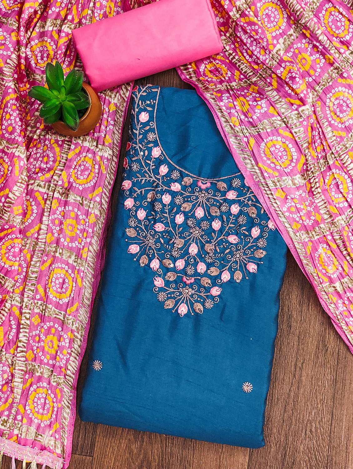 women solid with work unstitched suit set