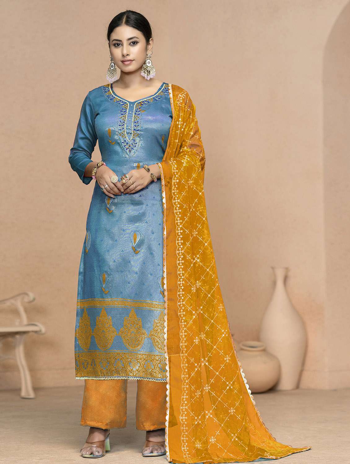women self design unstitched suit set
