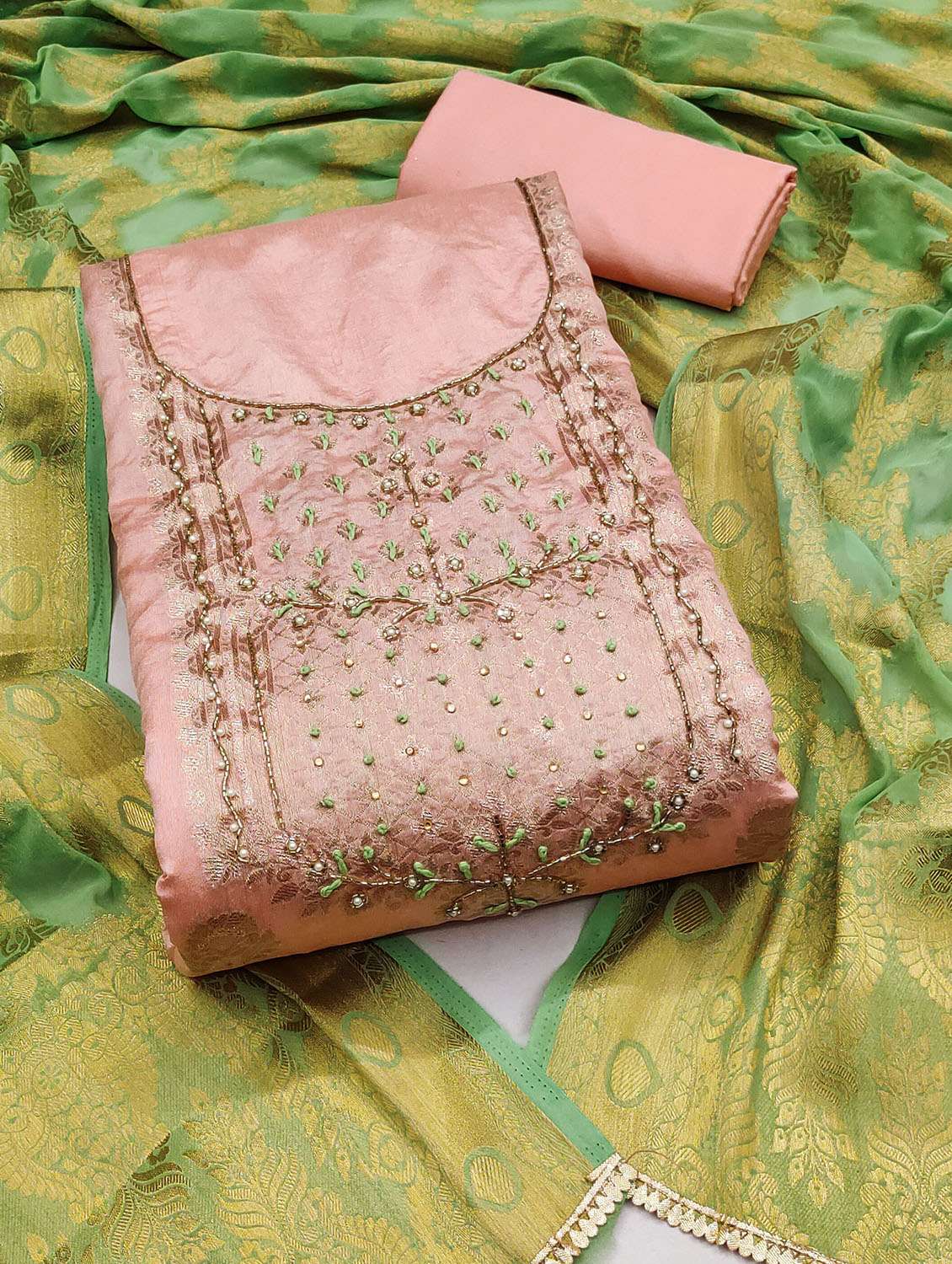 women self design unstitched suit set