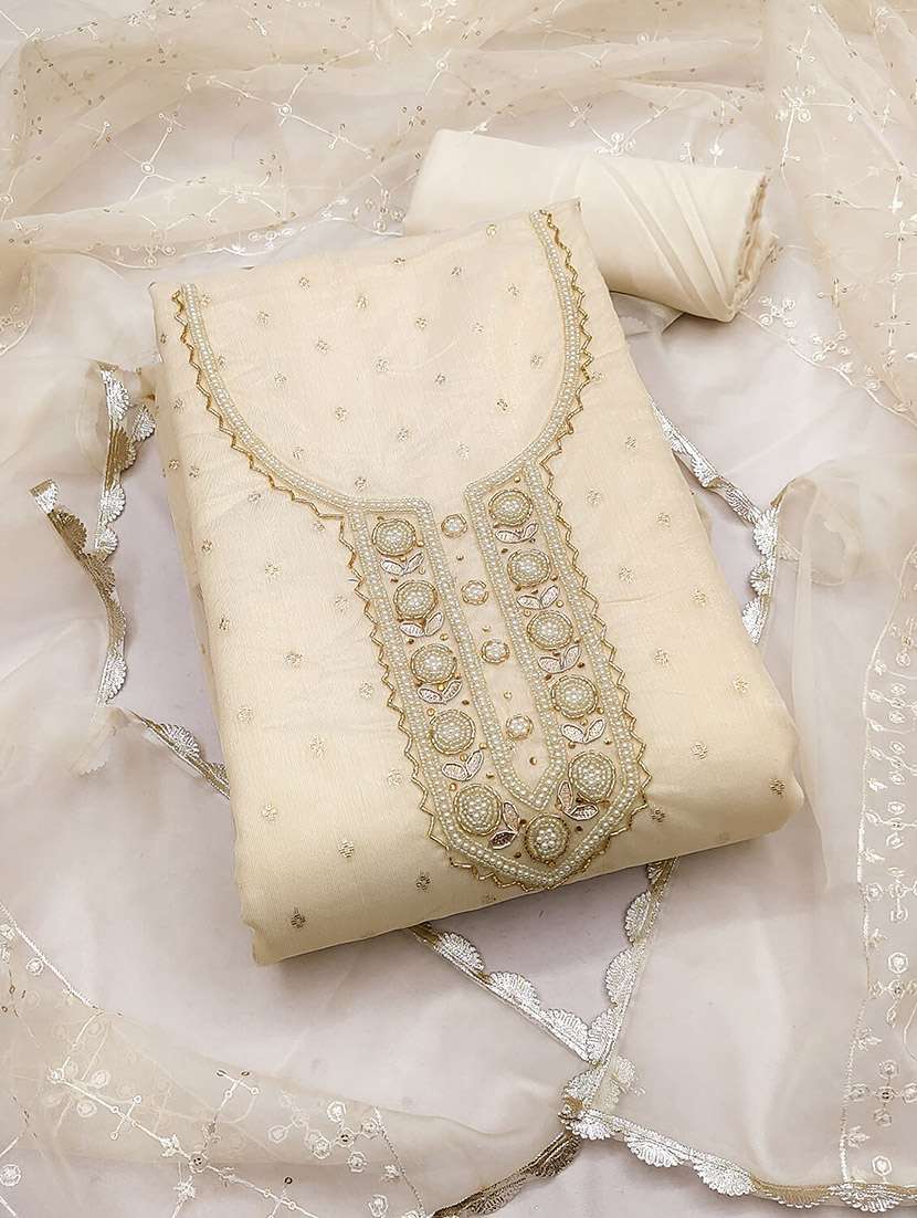 women self design unstitched suit set