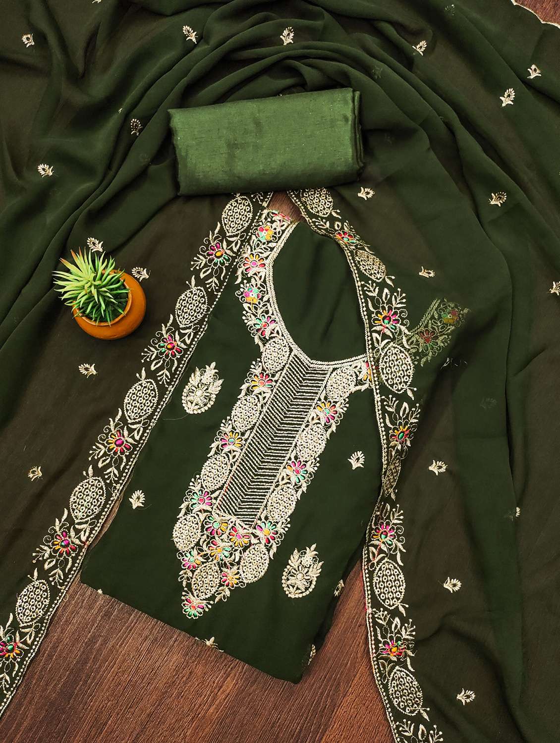 women solid with work unstitched suit set