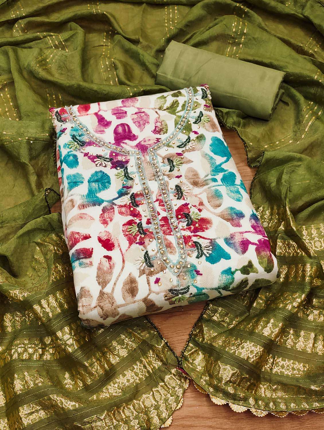 women printed unstitched suit set