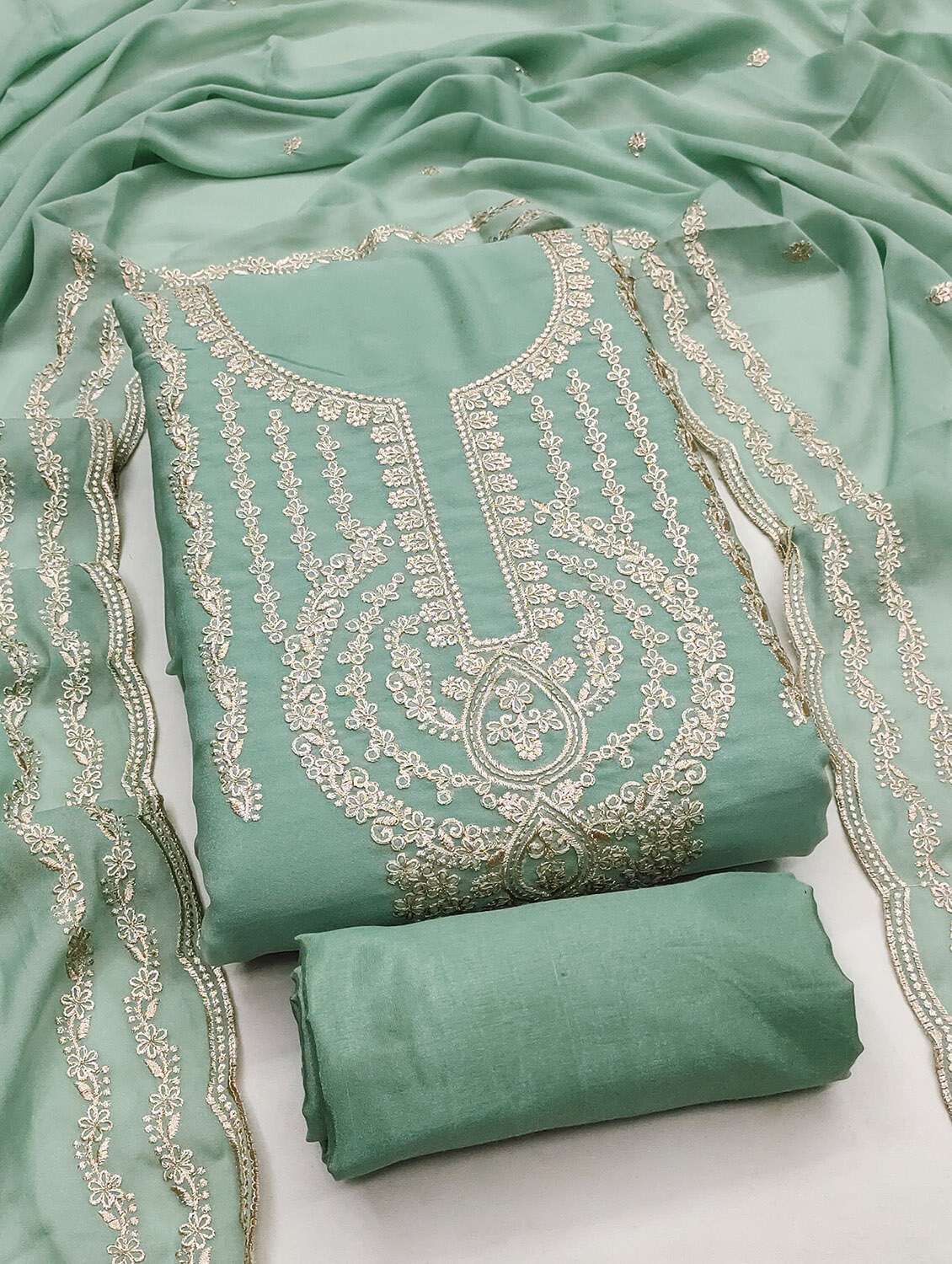 women solid with work unstitched suit set