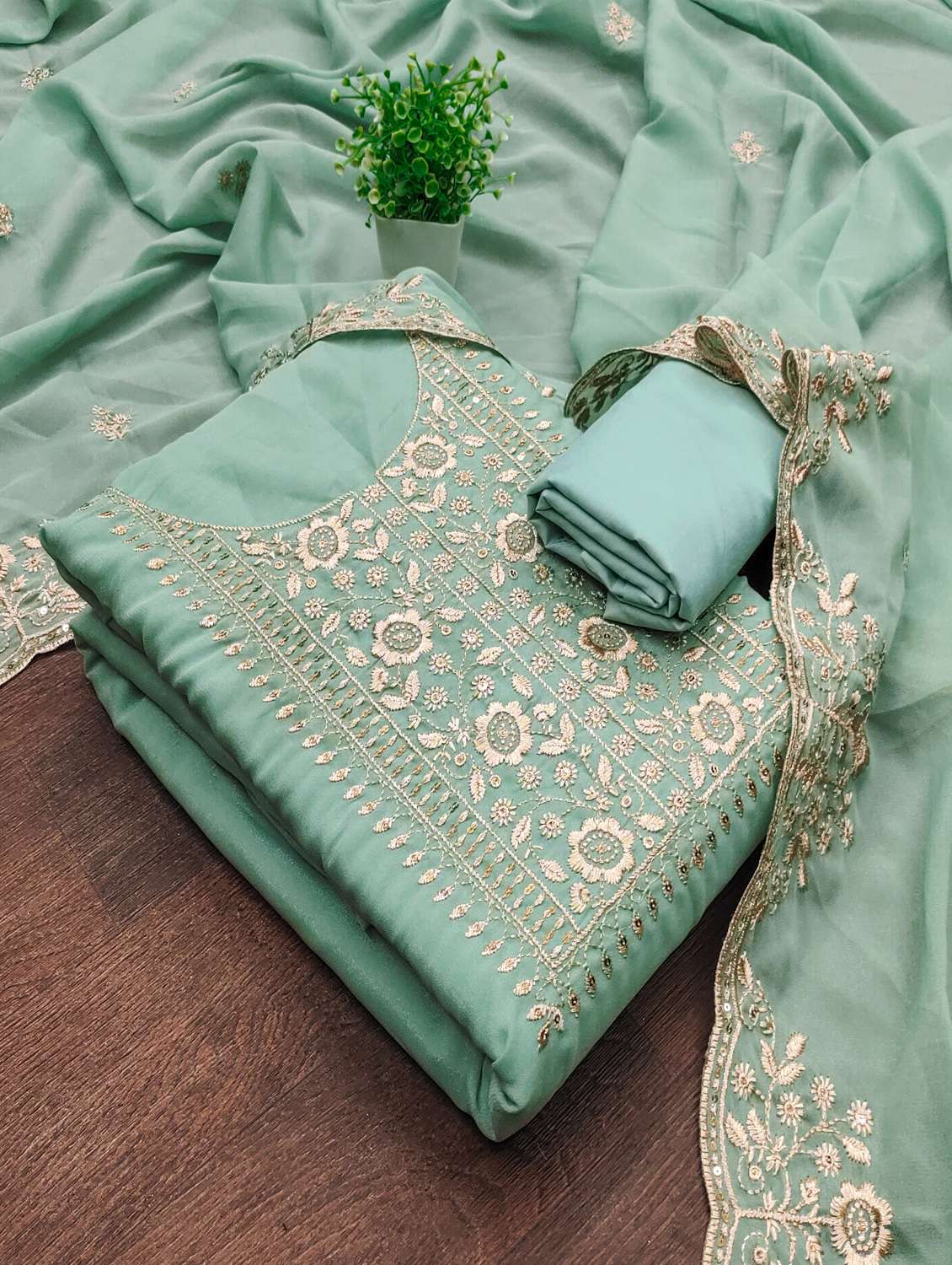 women solid with work unstitched suit set