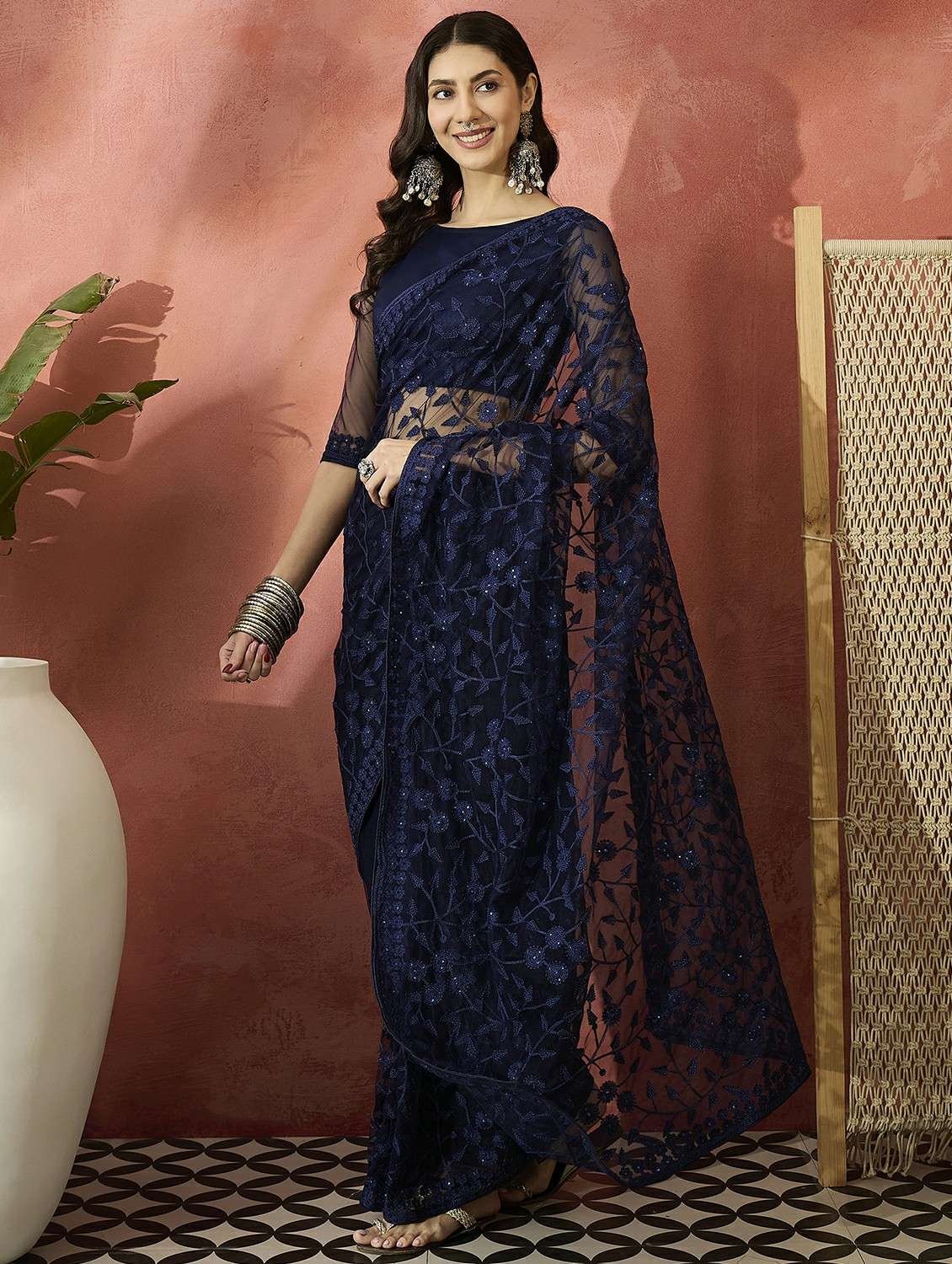women solid with work embroidered saree with blouse