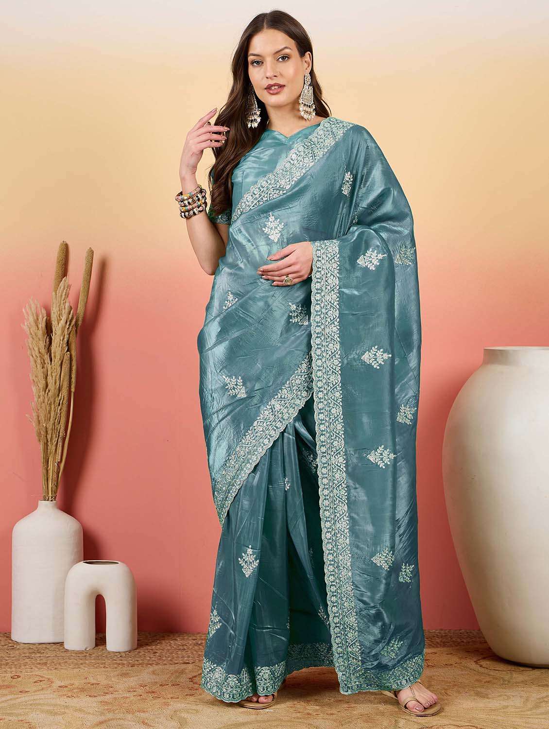 women solid with work embroidered saree with blouse