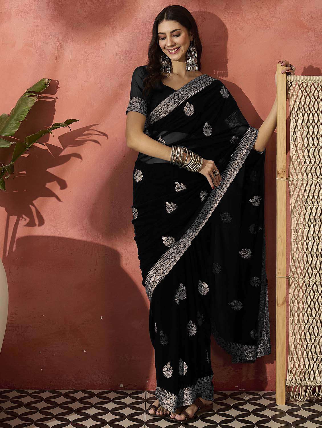 women solid with work embroidered saree with blouse