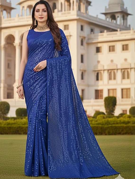 women solid with work embellished saree with blouse