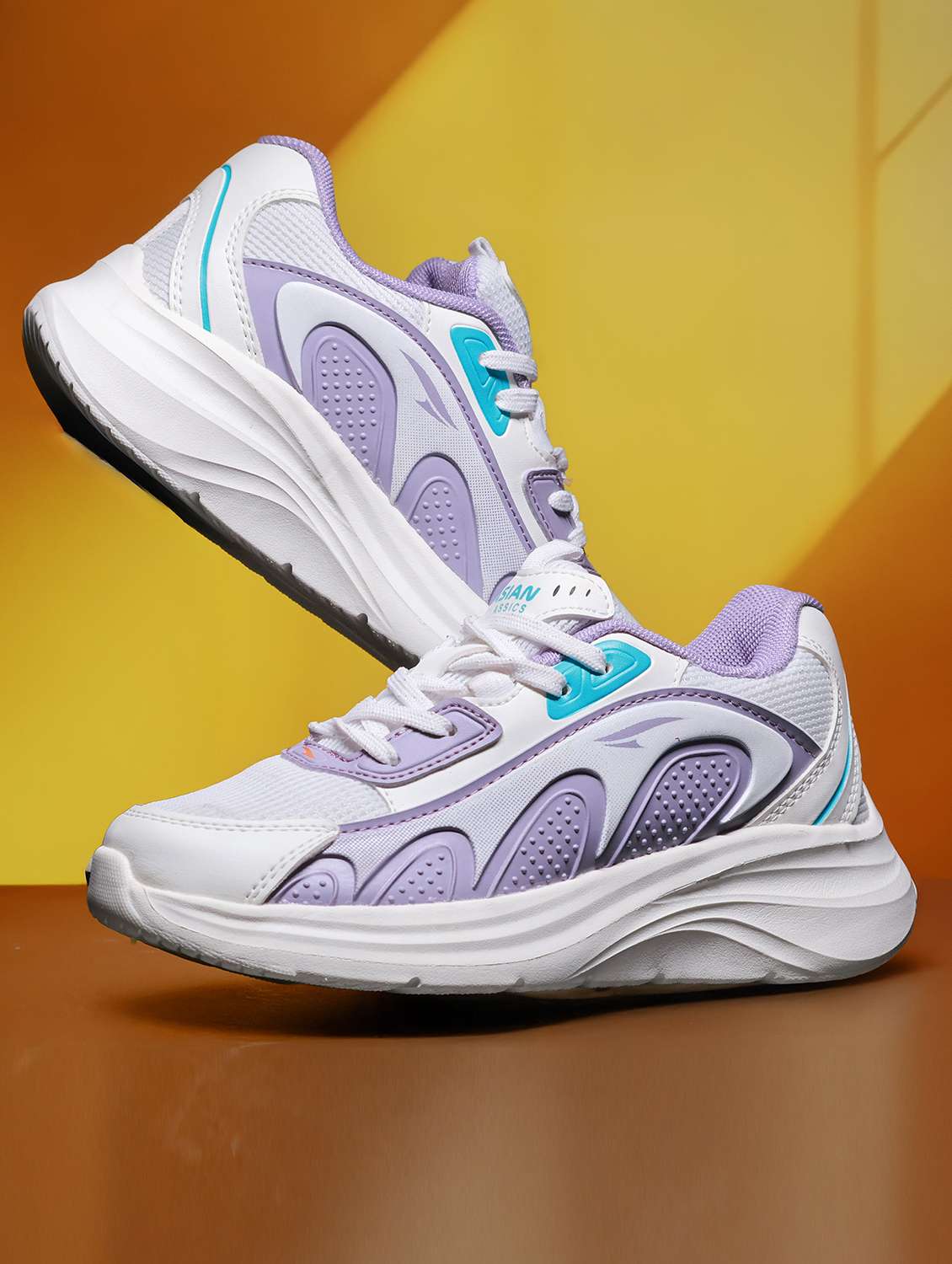 women solid lace-up sports shoe