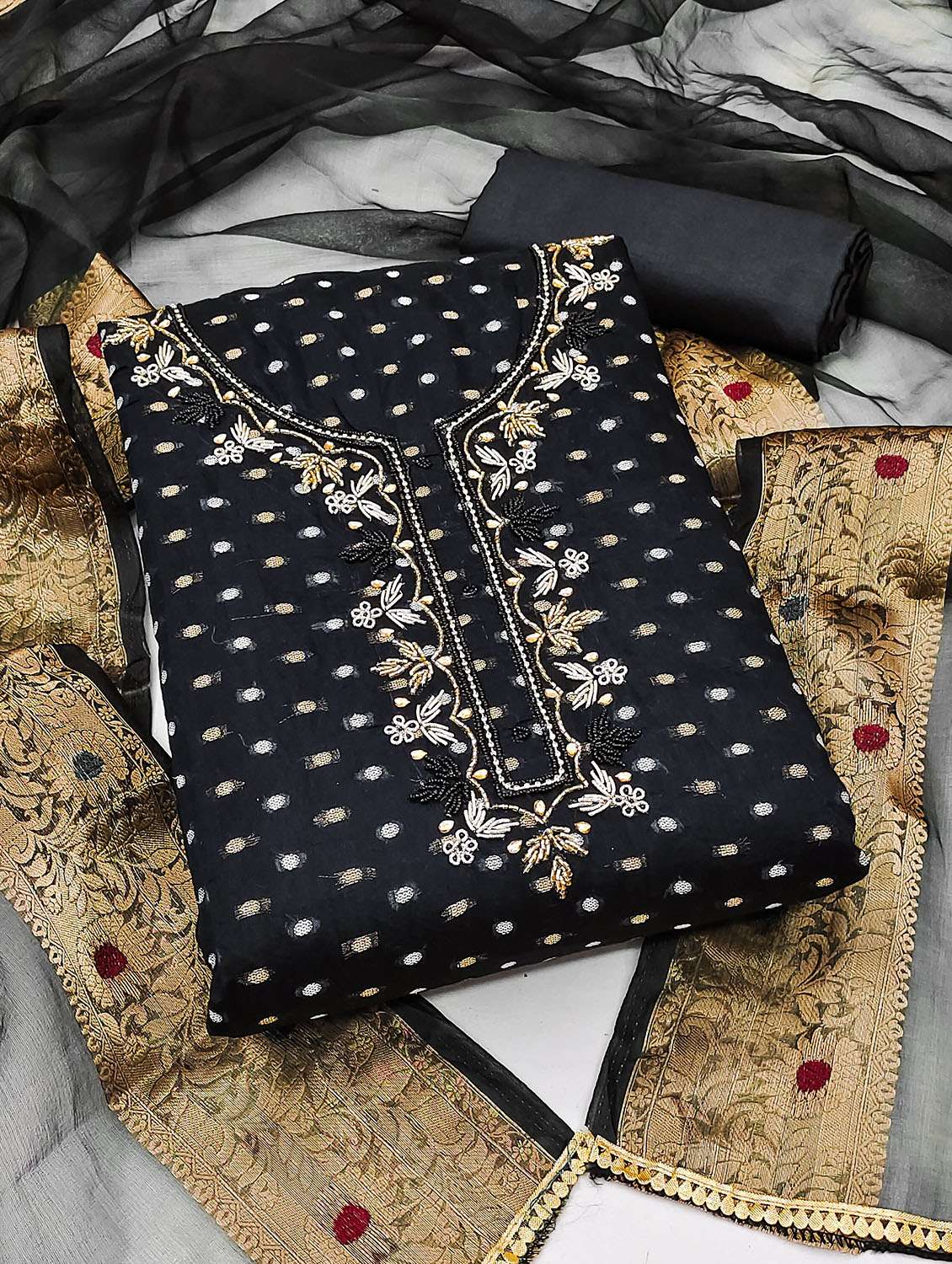 women self design unstitched suit set