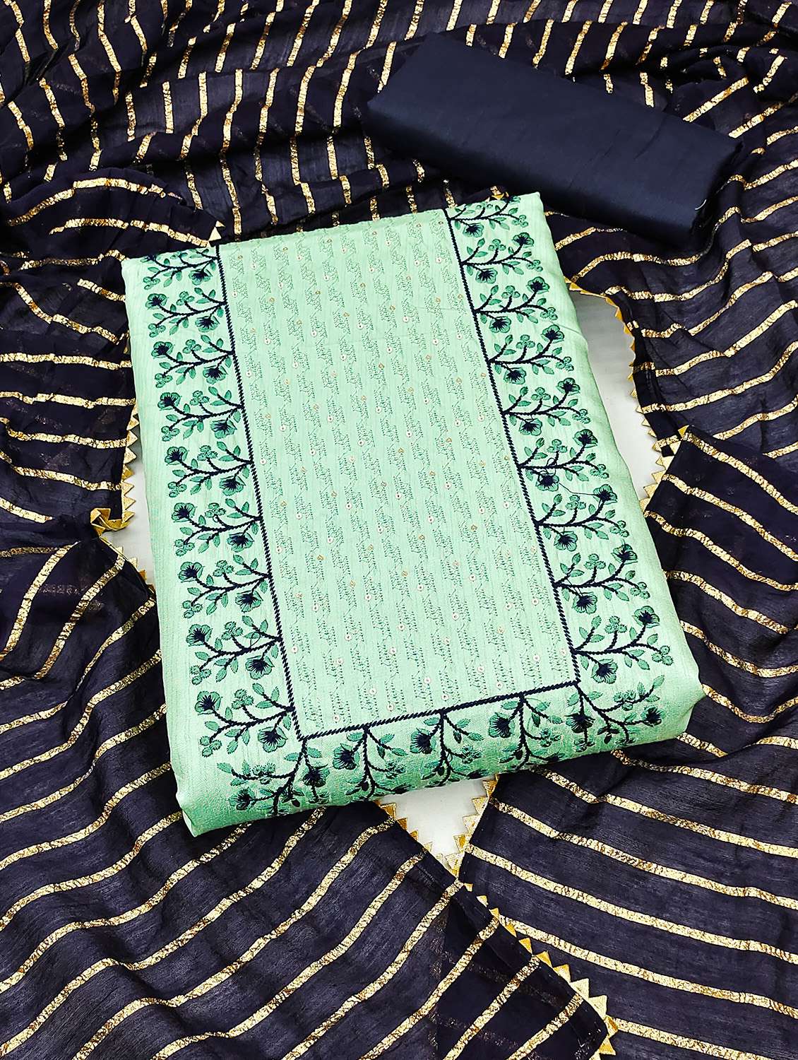 women solid with work unstitched suit set