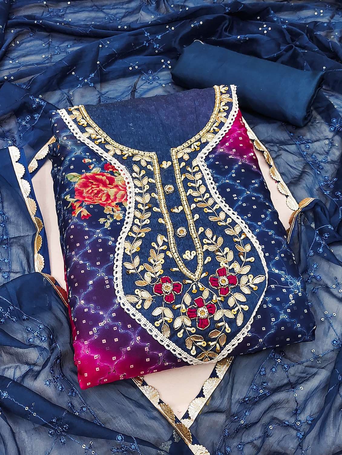 women printed unstitched suit set