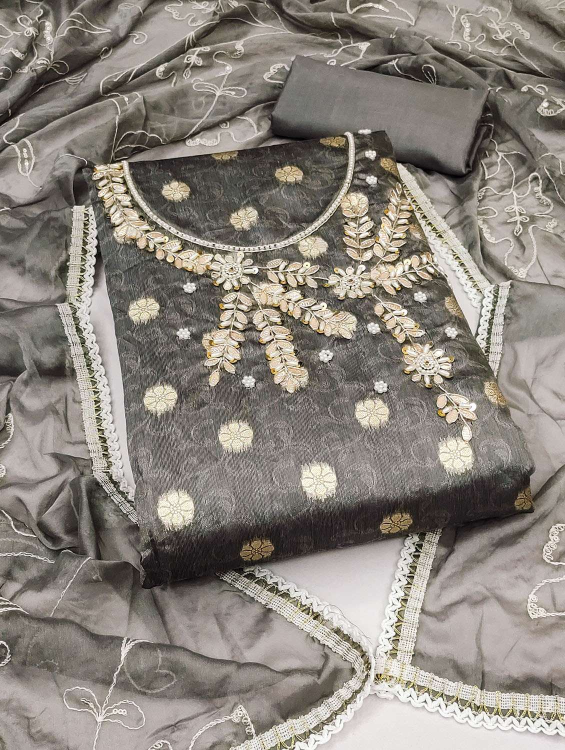women self design unstitched suit set