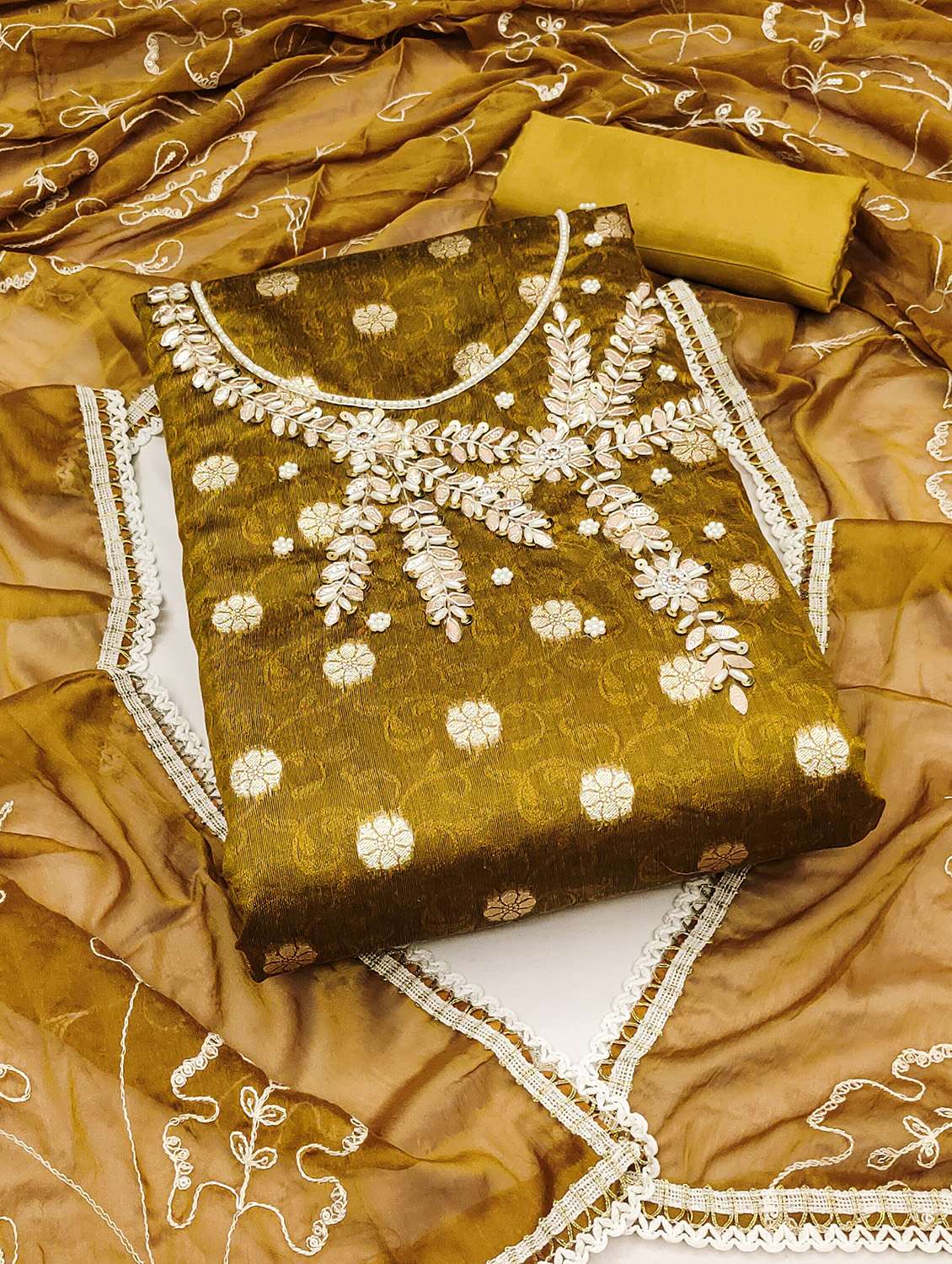 women self design unstitched suit set