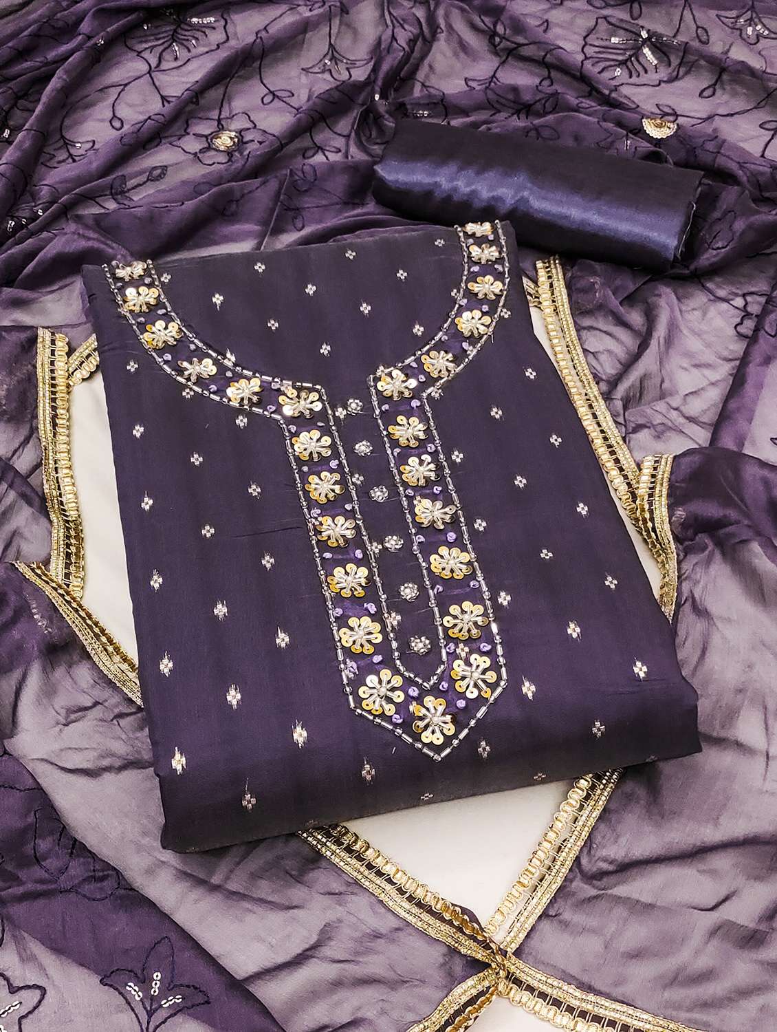 women self design unstitched suit set