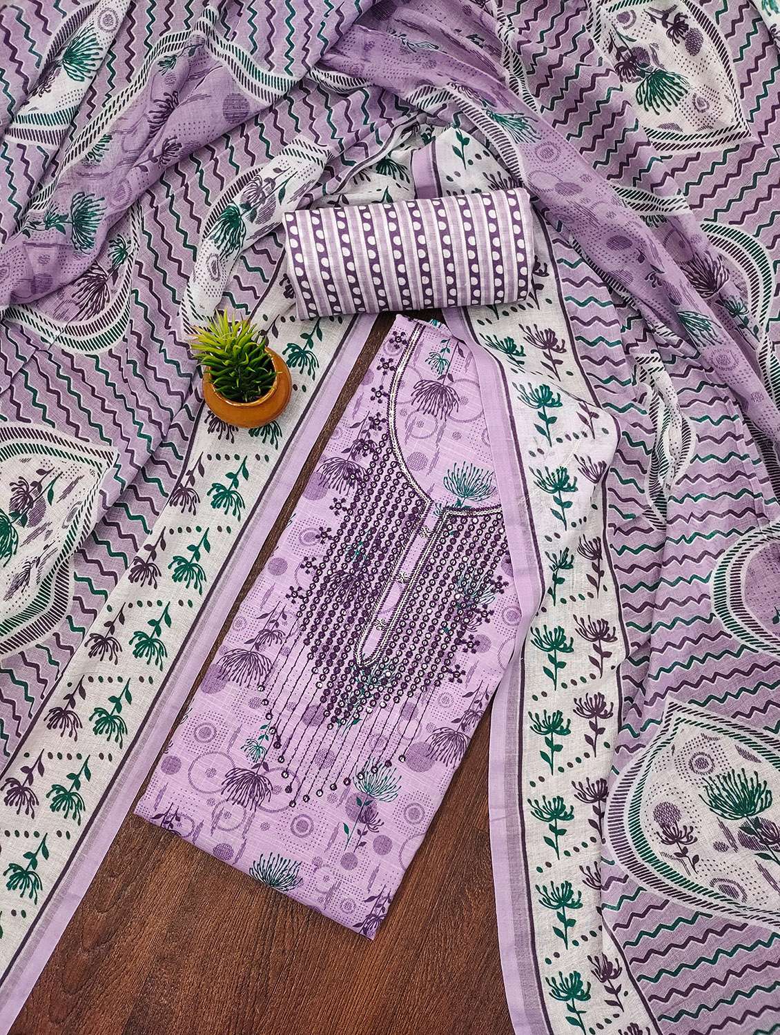 women printed unstitched suit set