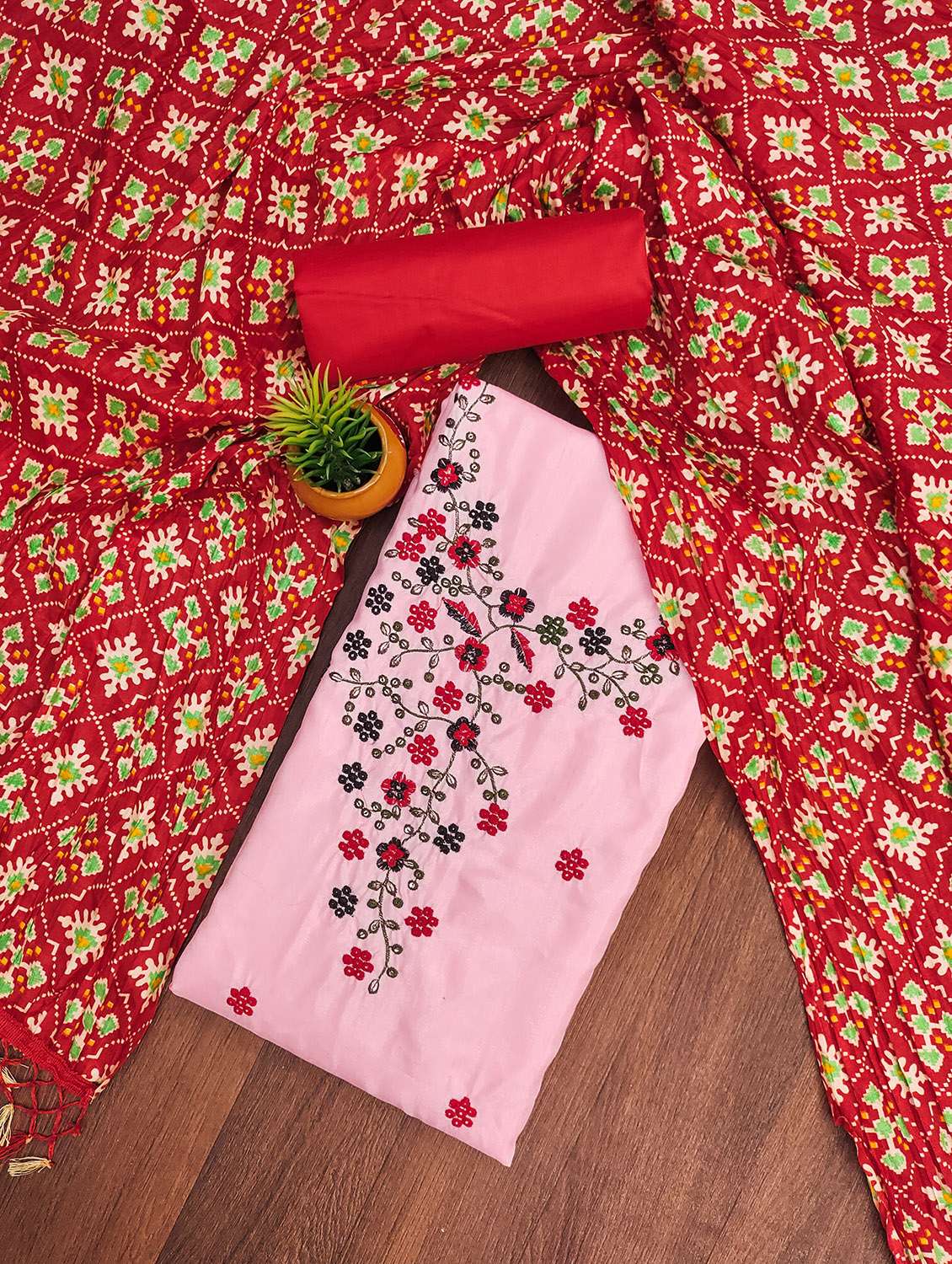women solid with work unstitched suit set