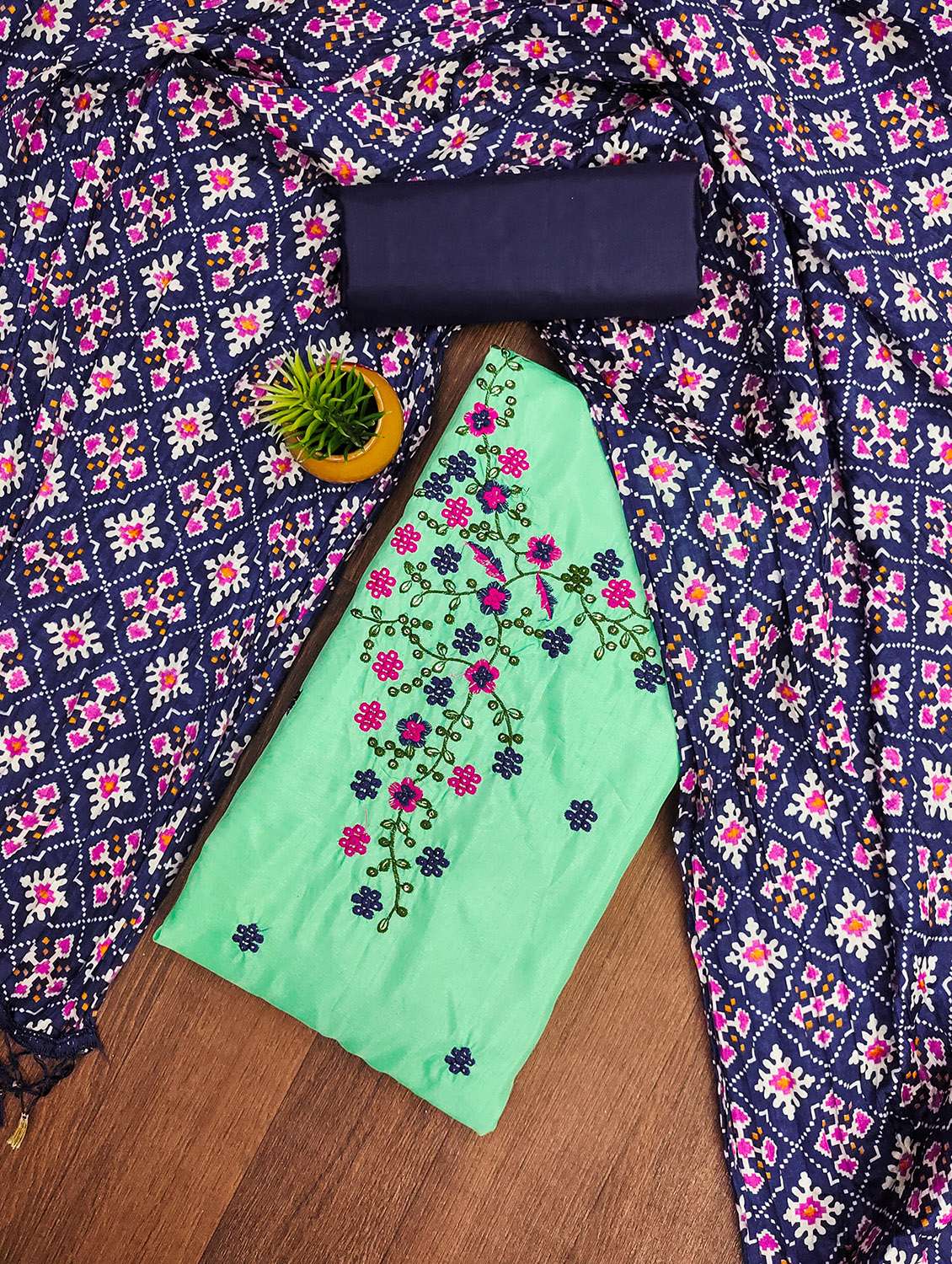 women solid with work unstitched suit set