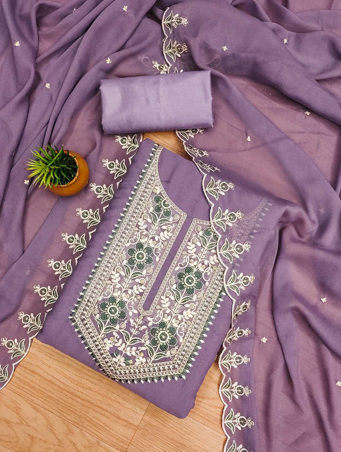 women solid with work unstitched suit set