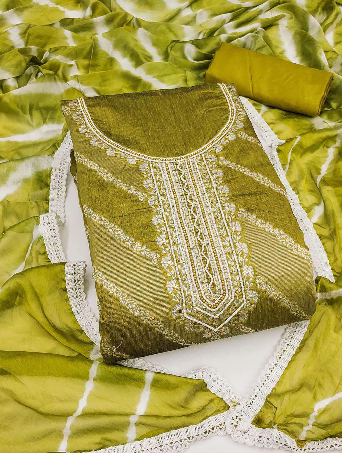 women self design unstitched suit set