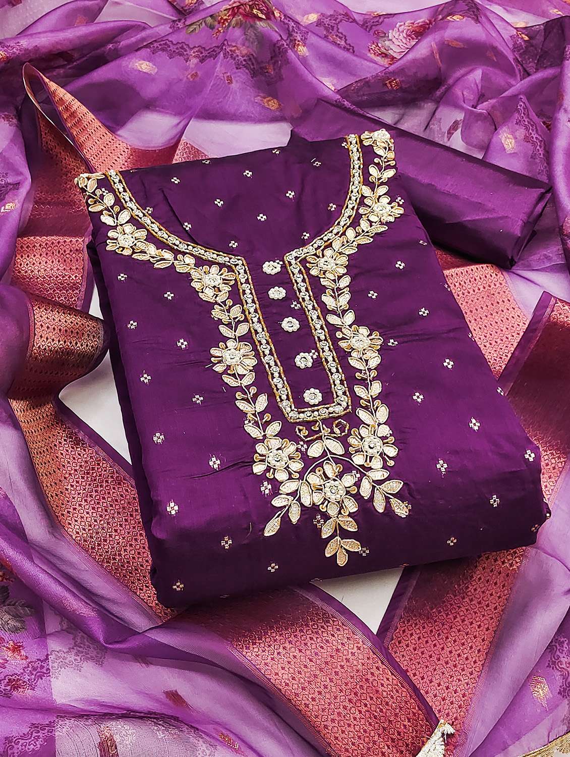 women self design unstitched suit set