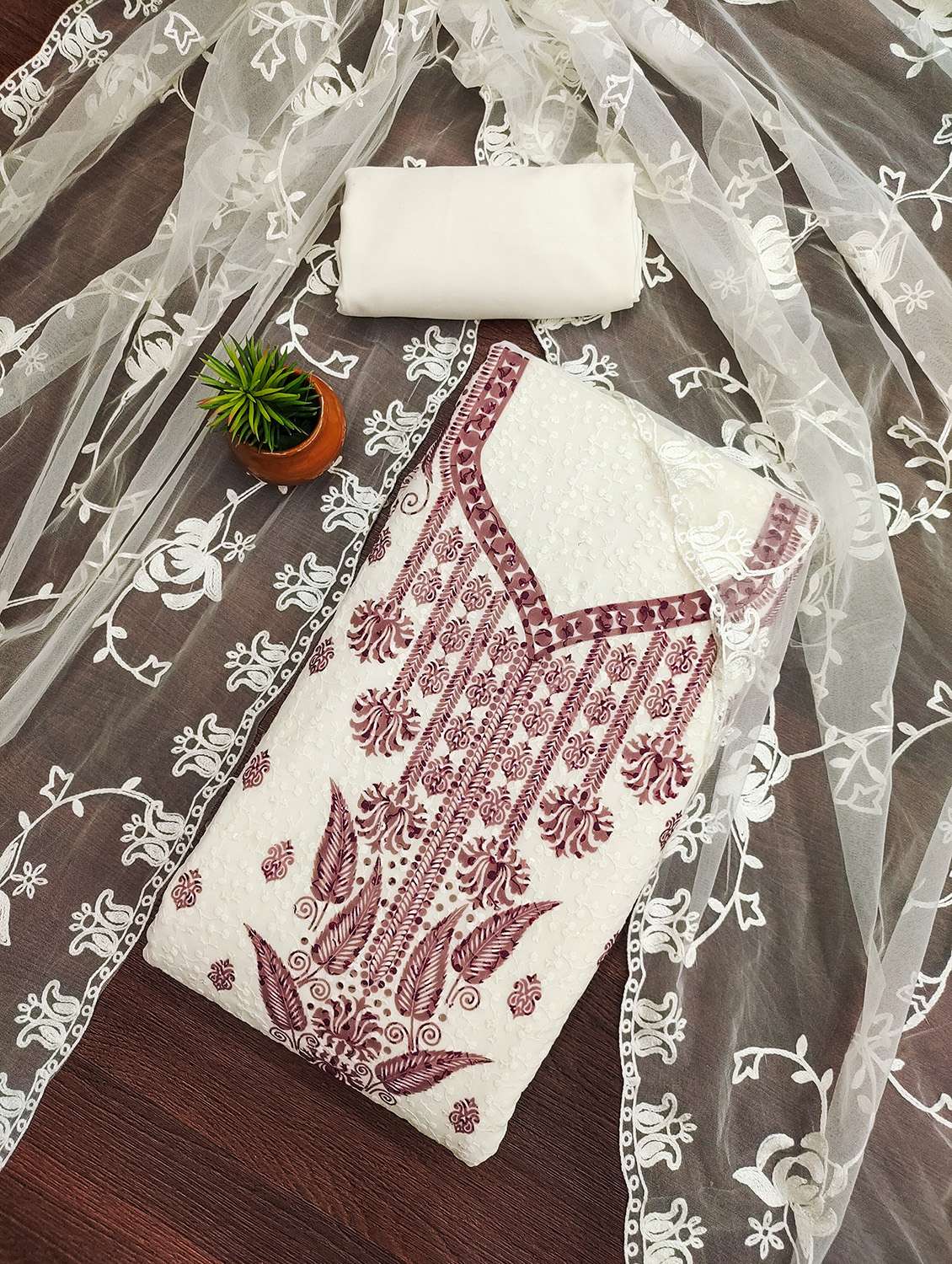 women printed unstitched suit set