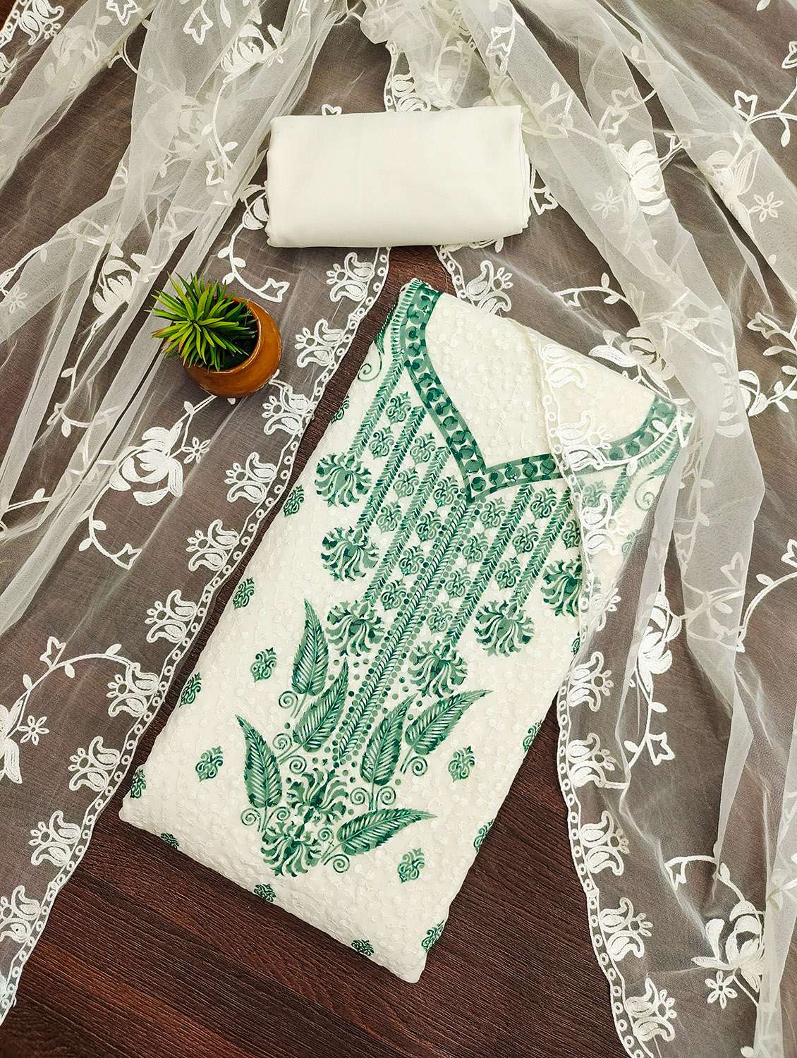 women printed unstitched suit set