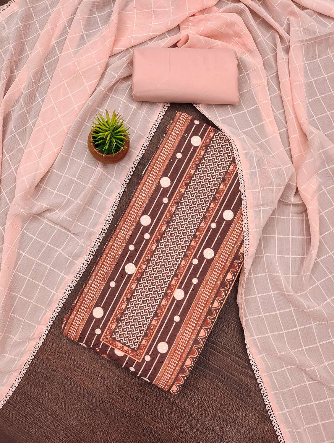 women printed unstitched suit set