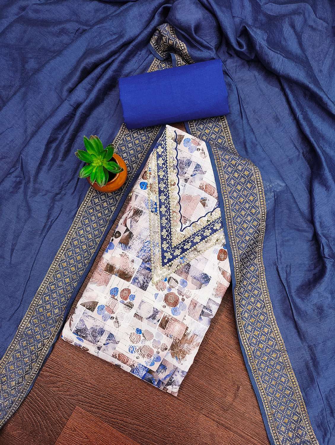 women printed unstitched suit set