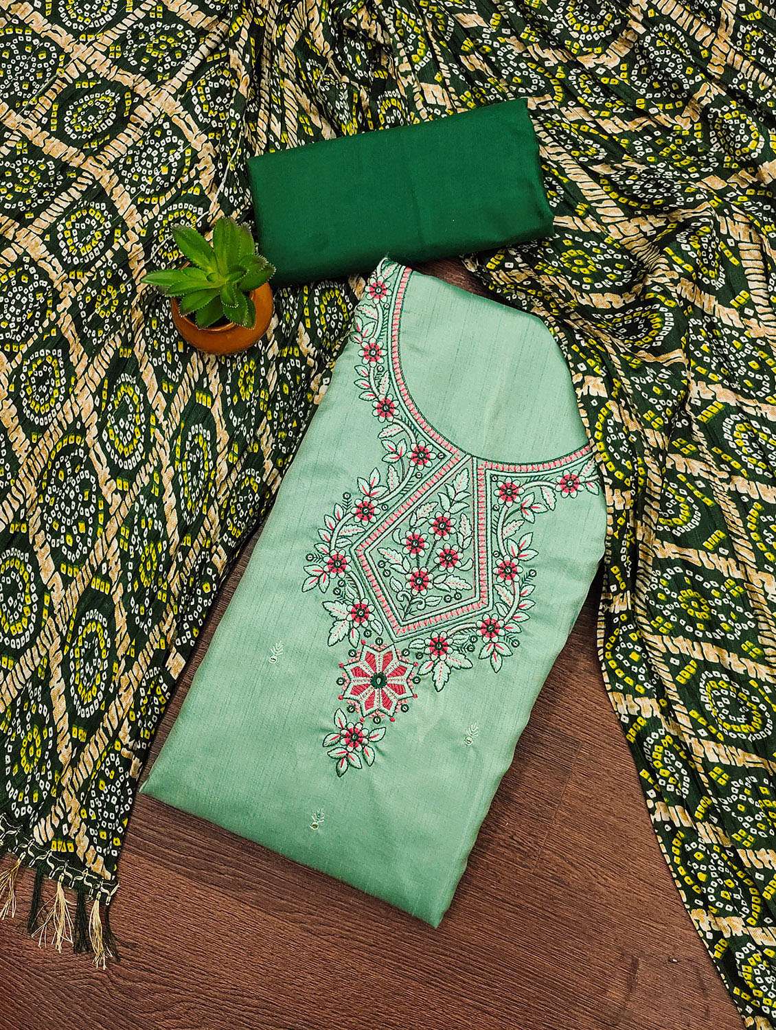 women solid with work unstitched suit set