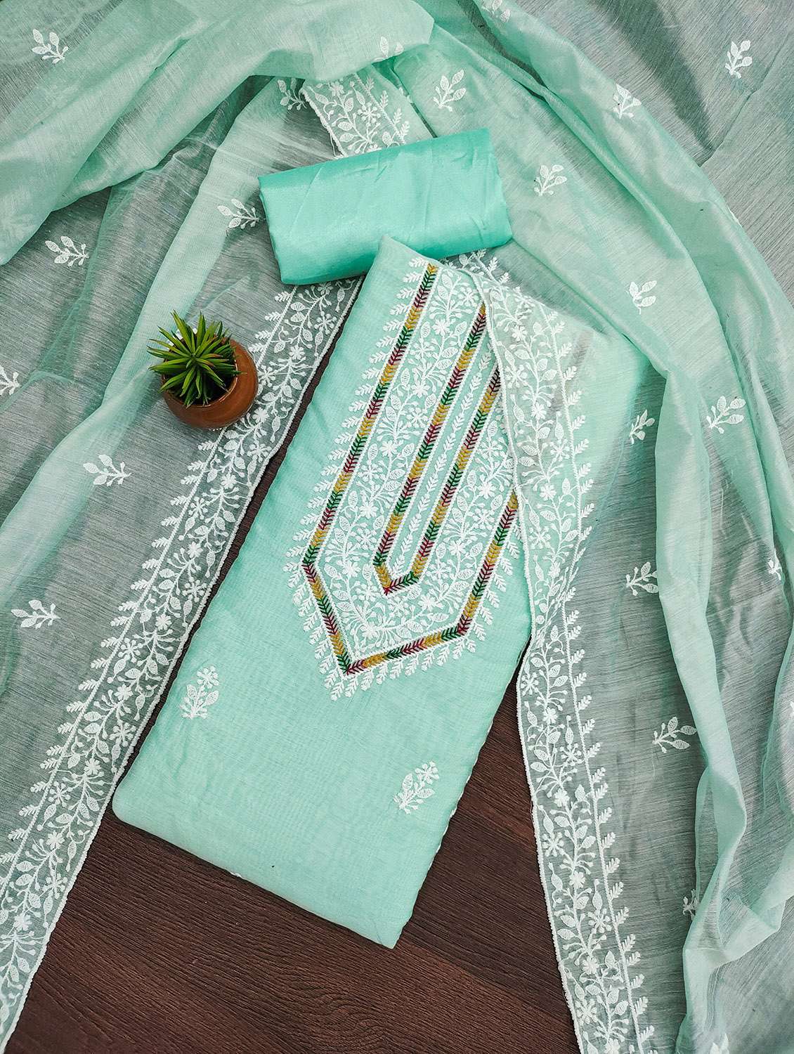 women solid with work unstitched suit set