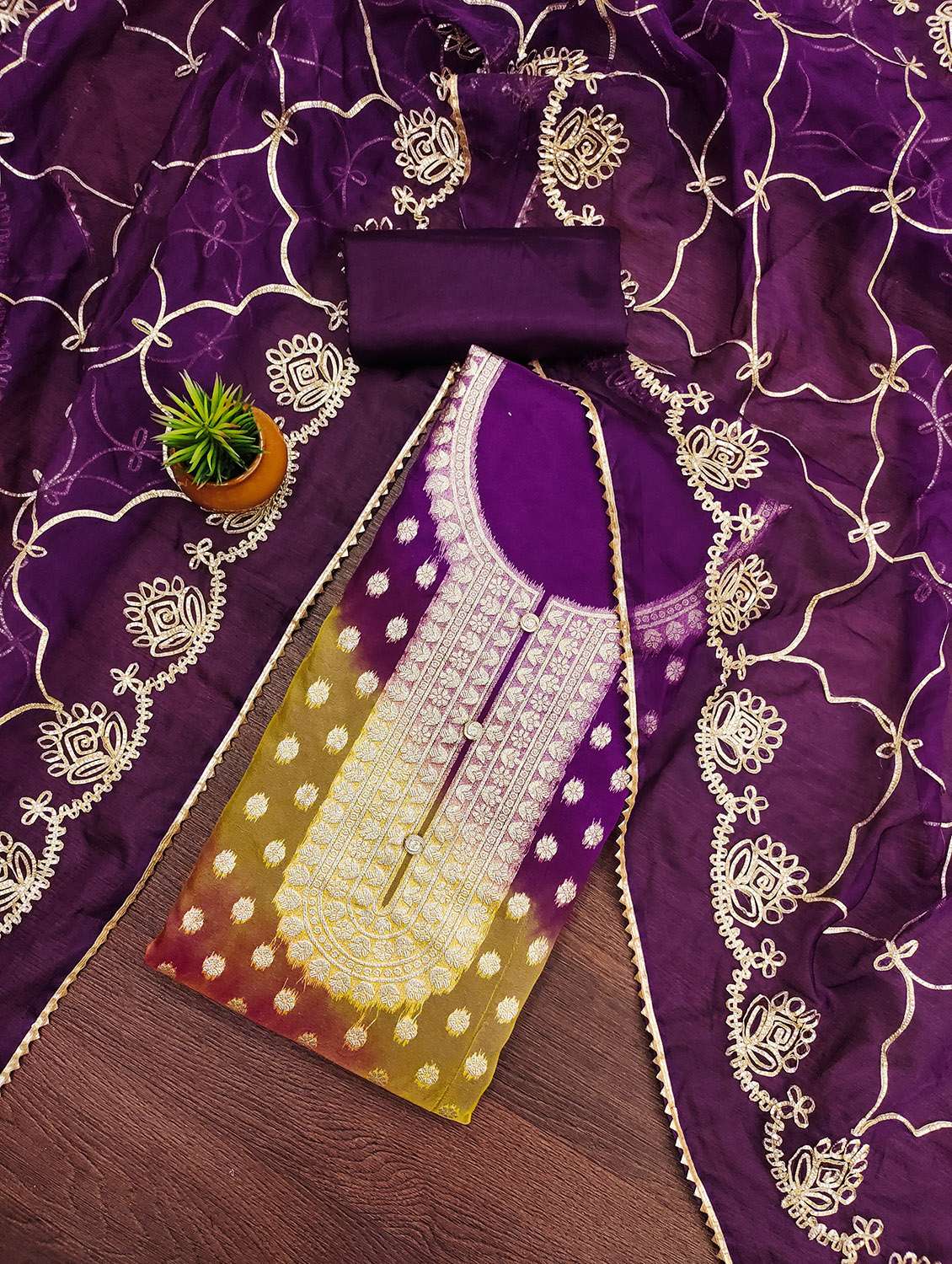 women self design unstitched suit set
