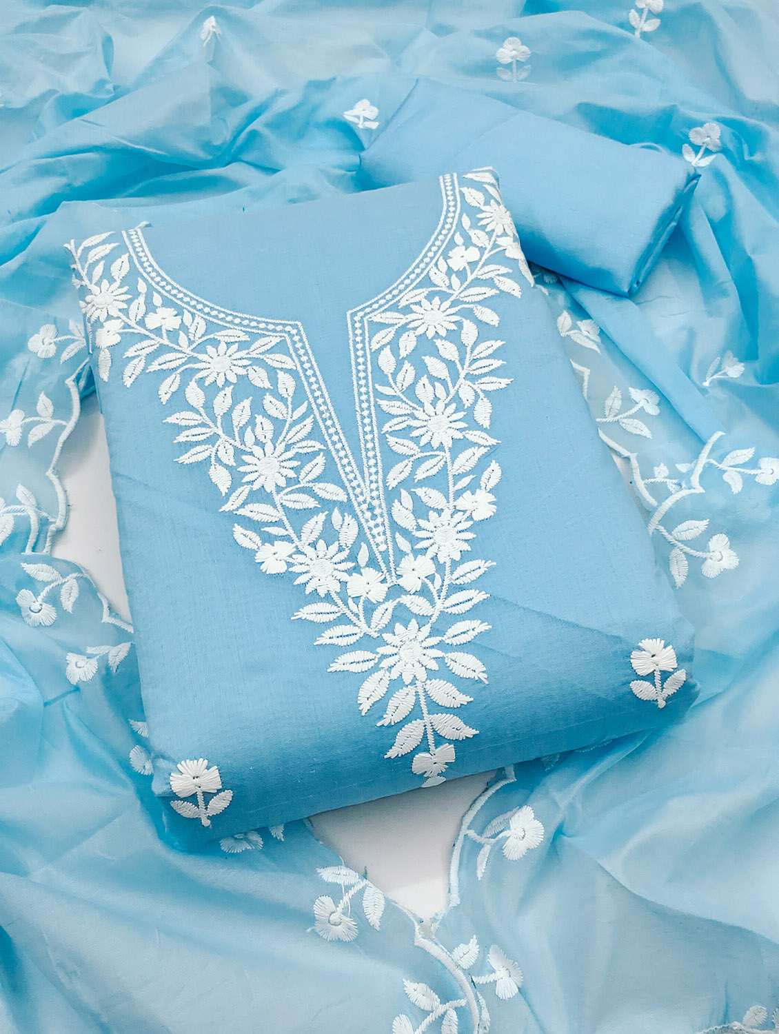 women solid with work unstitched suit set