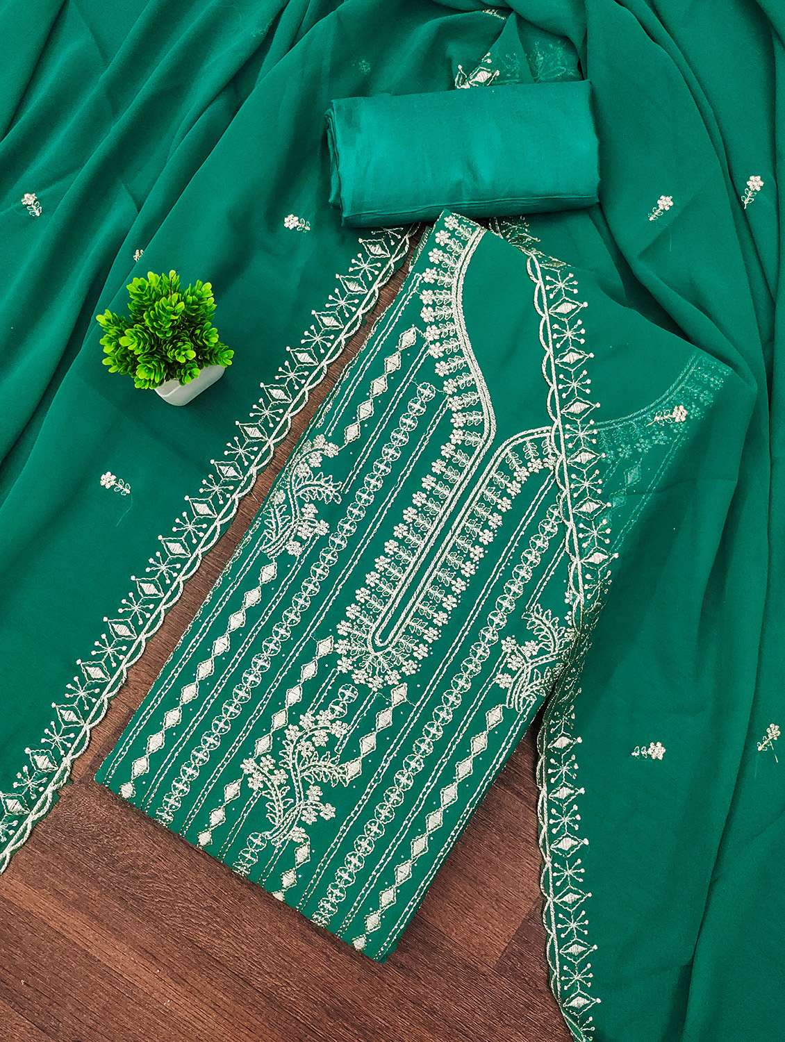 women solid with work unstitched suit set