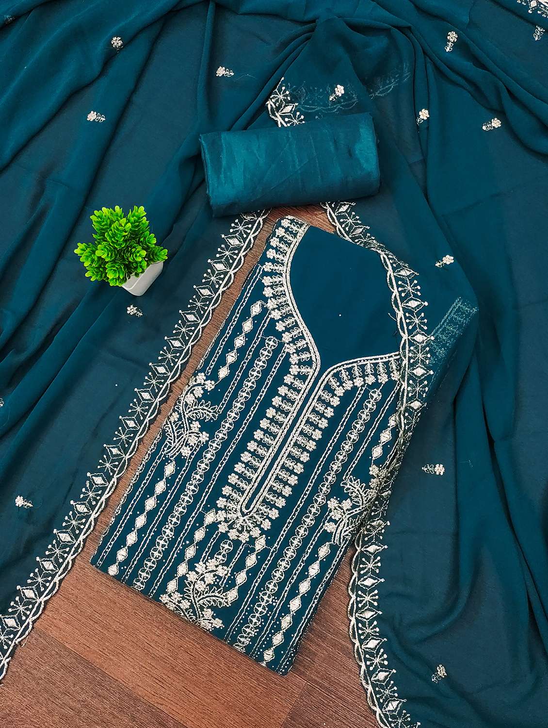 women solid with work unstitched suit set