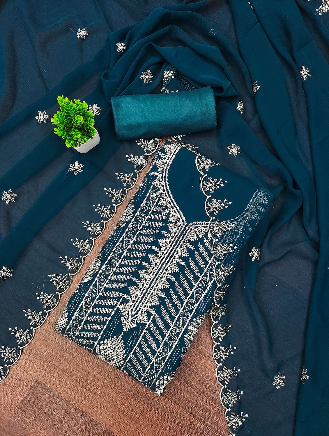 women solid with work unstitched suit set