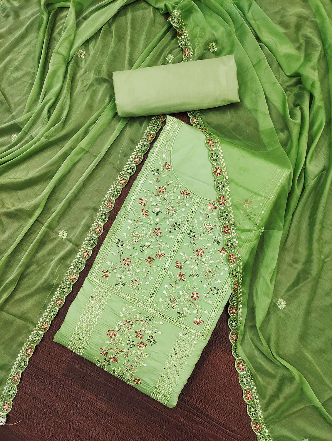 women solid with work unstitched suit set