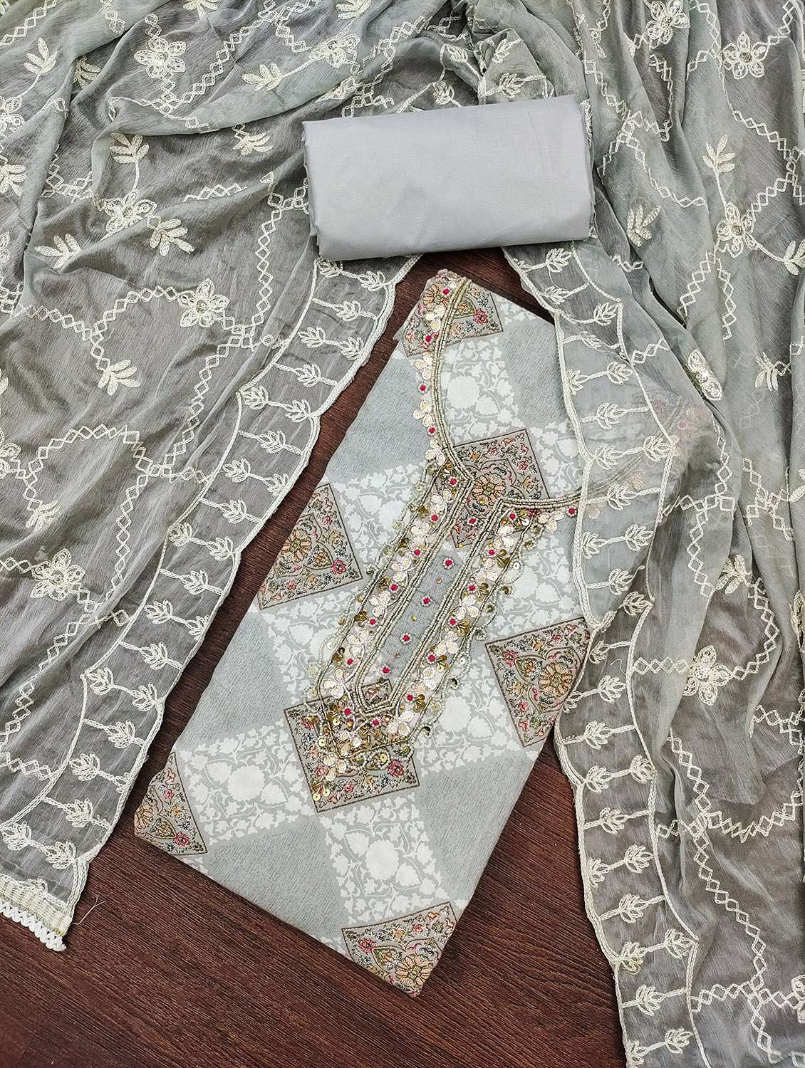 women printed unstitched suit set