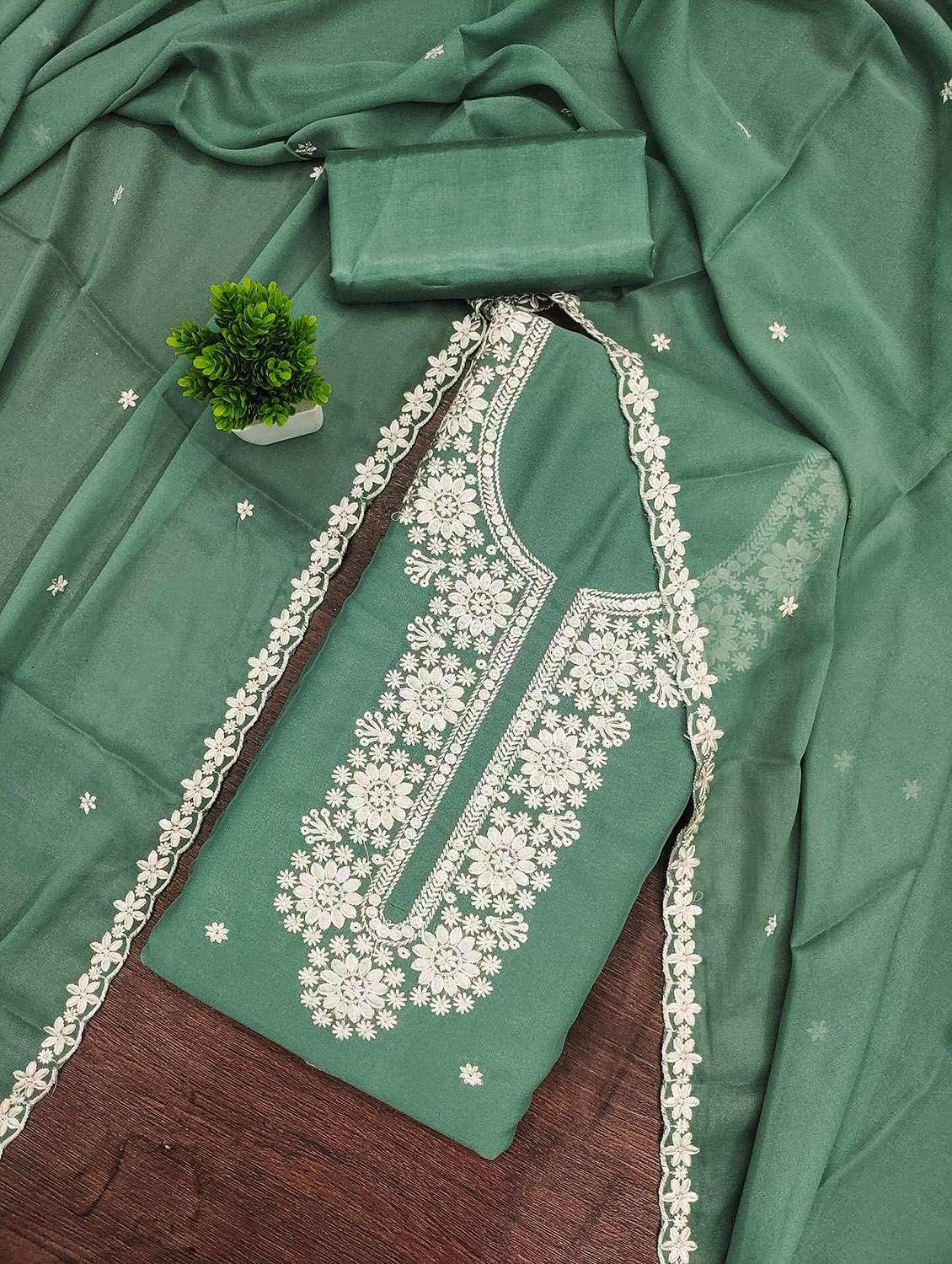 women solid with work unstitched suit set