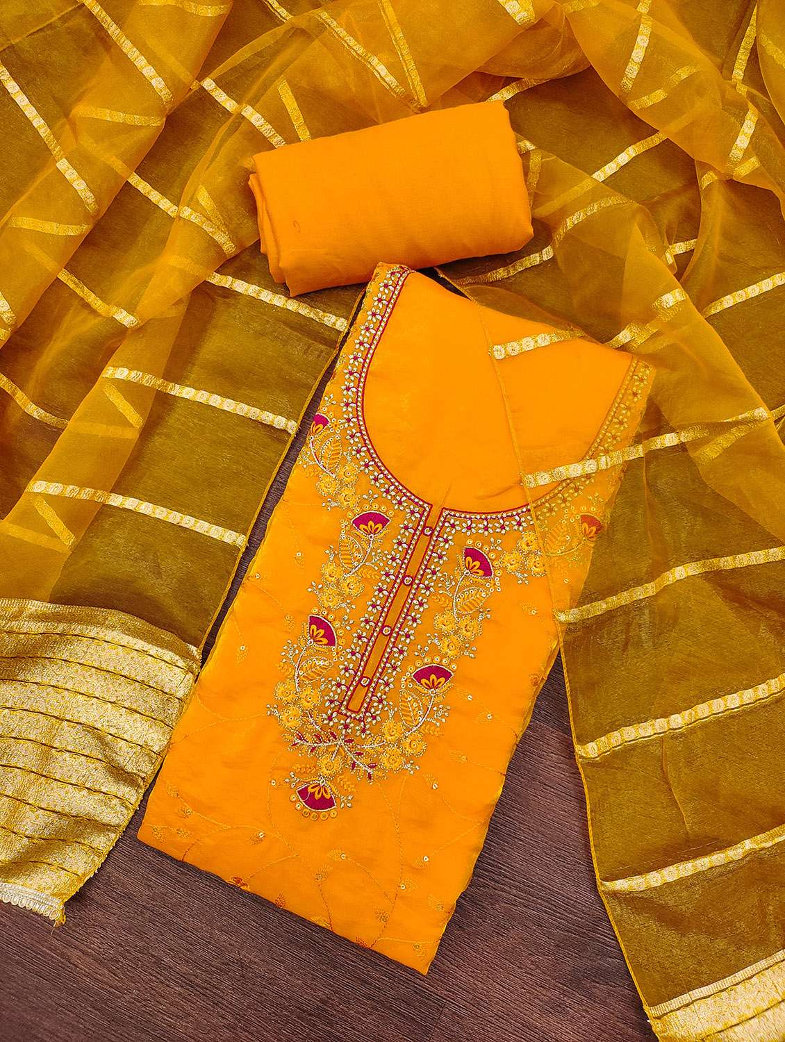 women solid with work unstitched suit set