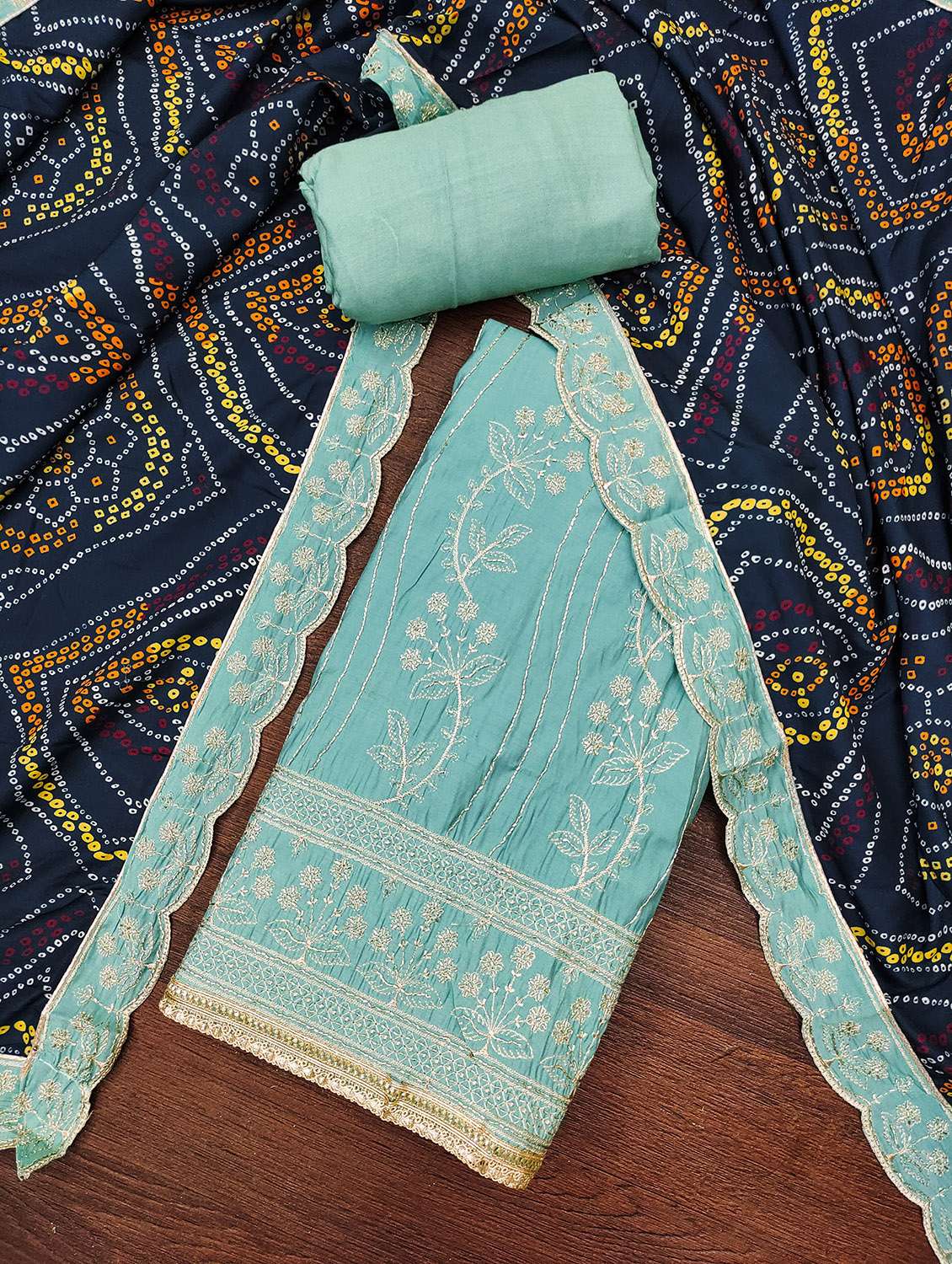 women solid with work unstitched suit set