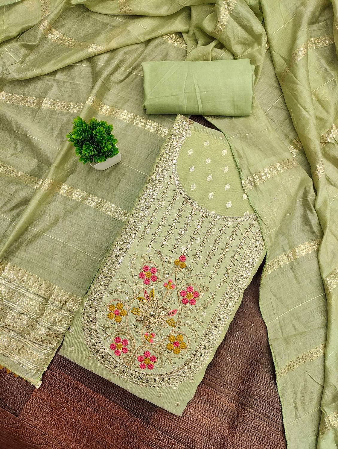 women self design unstitched suit set