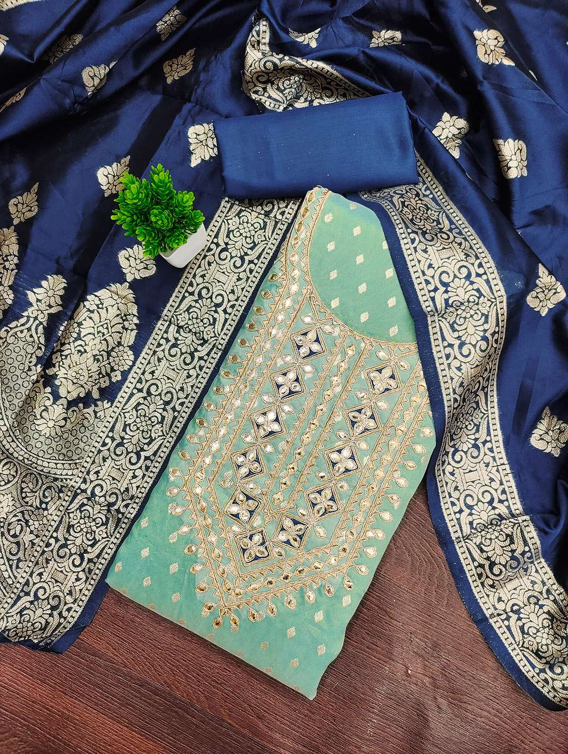 women self design unstitched suit set