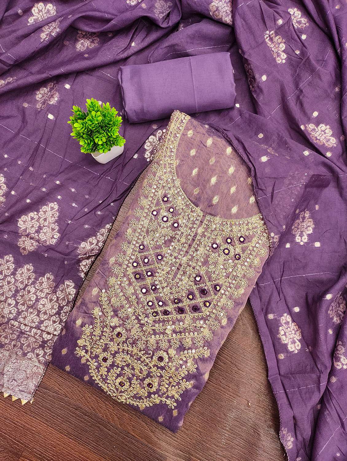 women self design unstitched suit set