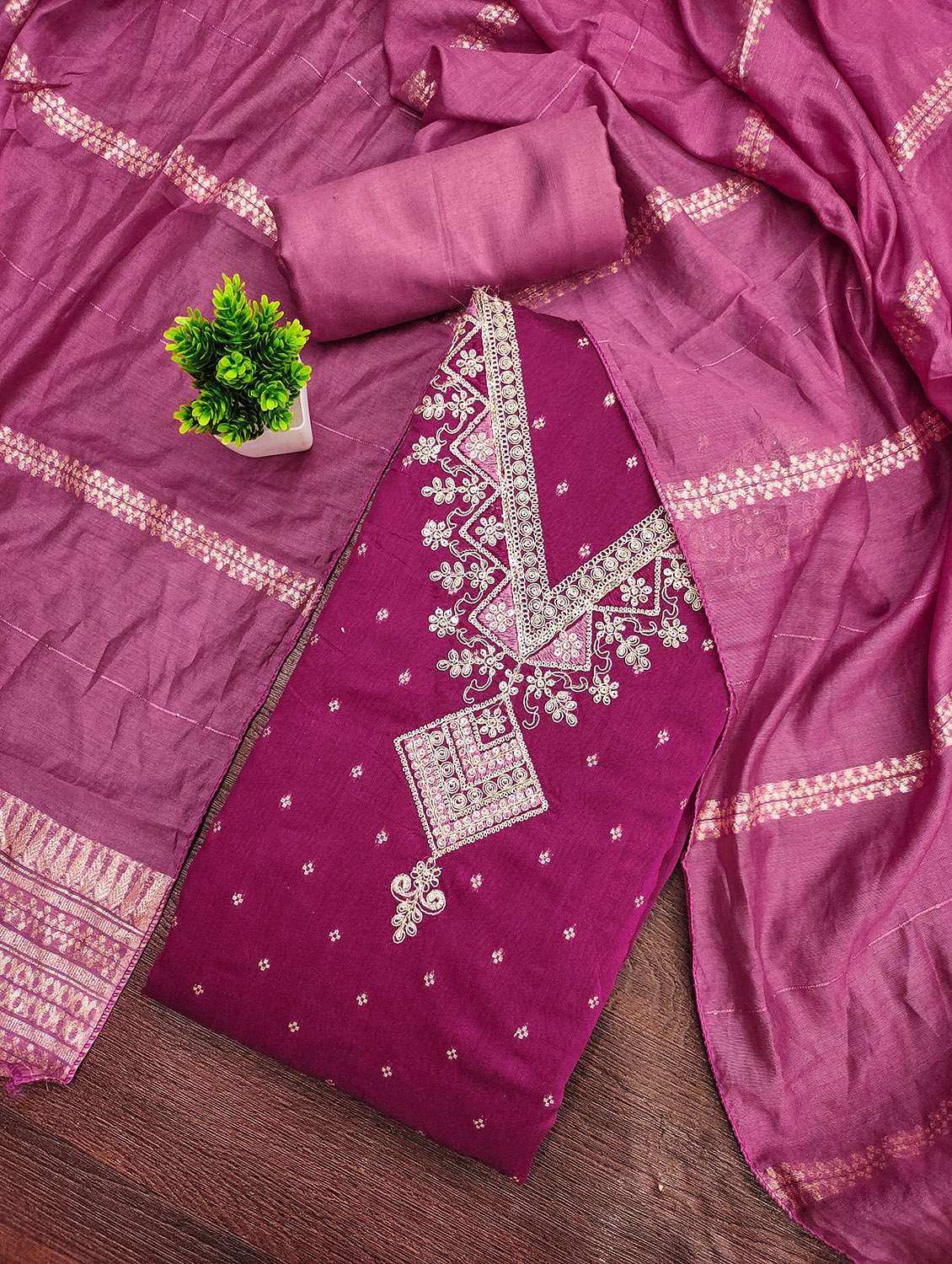 women self design unstitched suit set