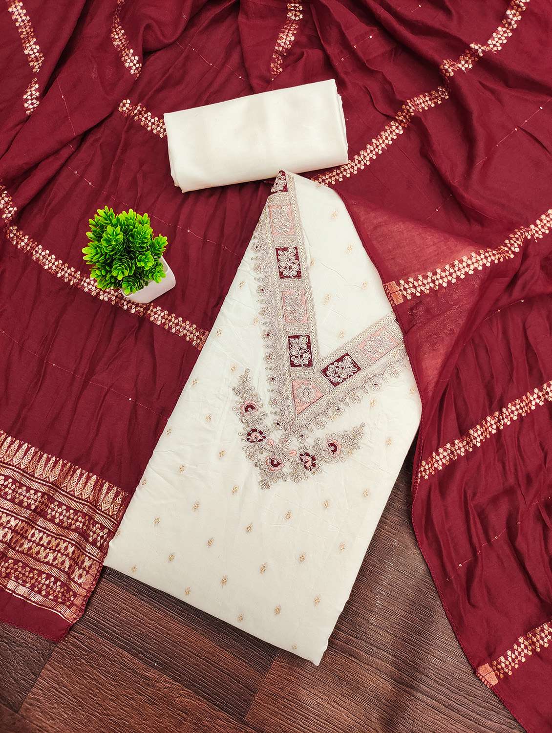 women self design unstitched suit set