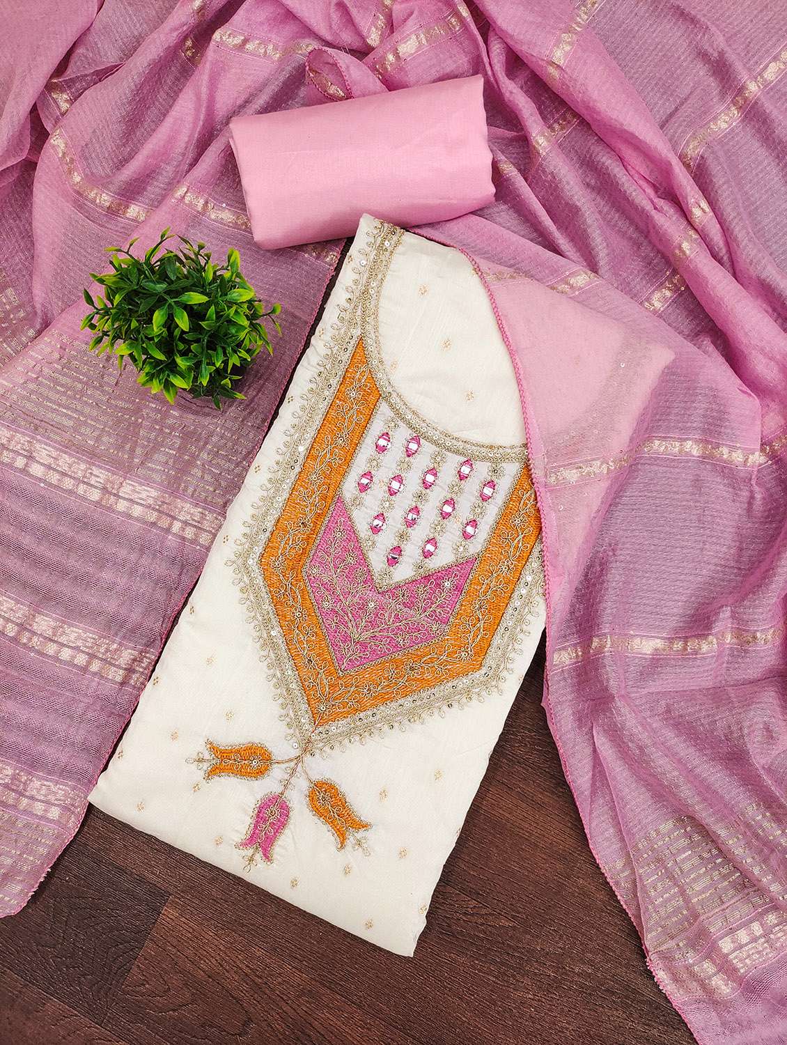 women self design unstitched suit set